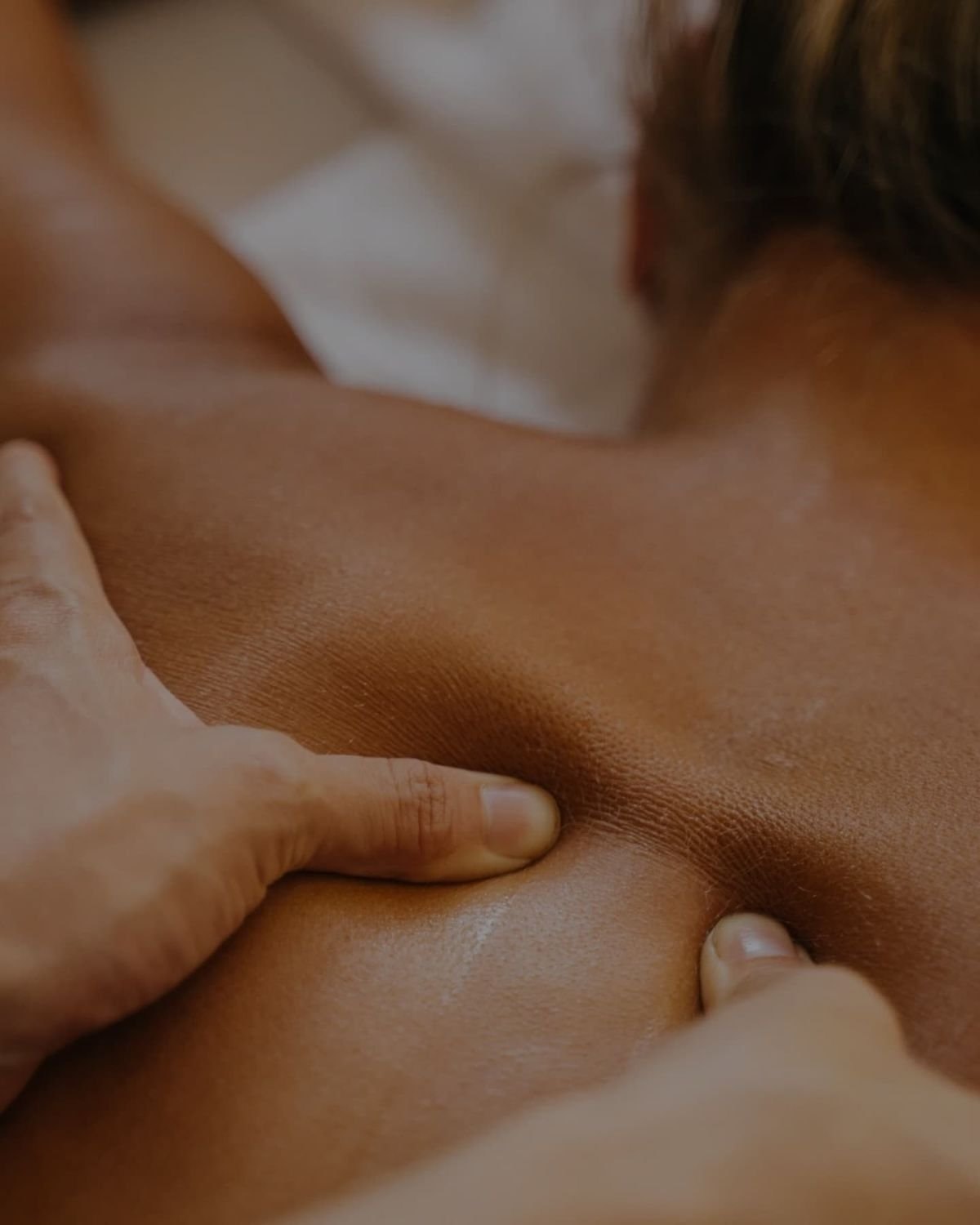 Massage across the shoulders